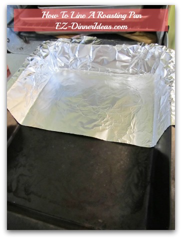 How To Line A Roasting Pan? - Use your fingers gently push down the foil to cover the corners